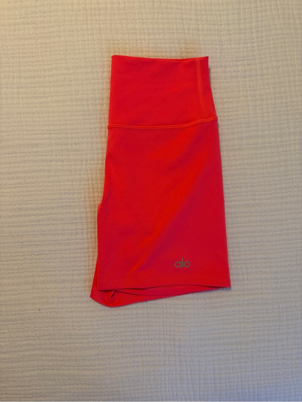 ALO Yoga High-Waist Bike Shorts in Coral Pink